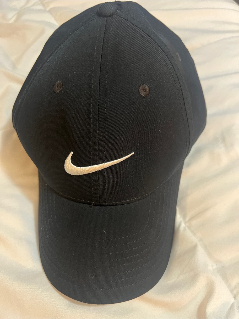 Nike Black Cap with White Swoosh Logo